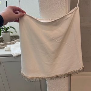 Lulu’s white skirt with crystals